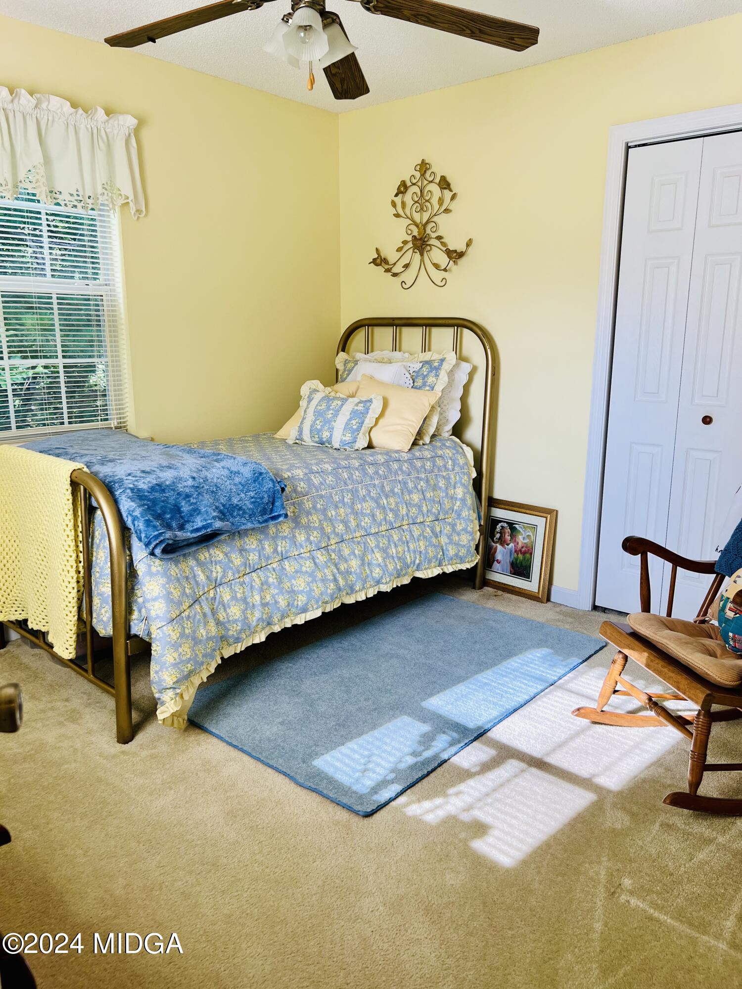 25 Ruby Road Jackson, GA 30233 - Photo 25 of 29 a bedroom with a bed and window