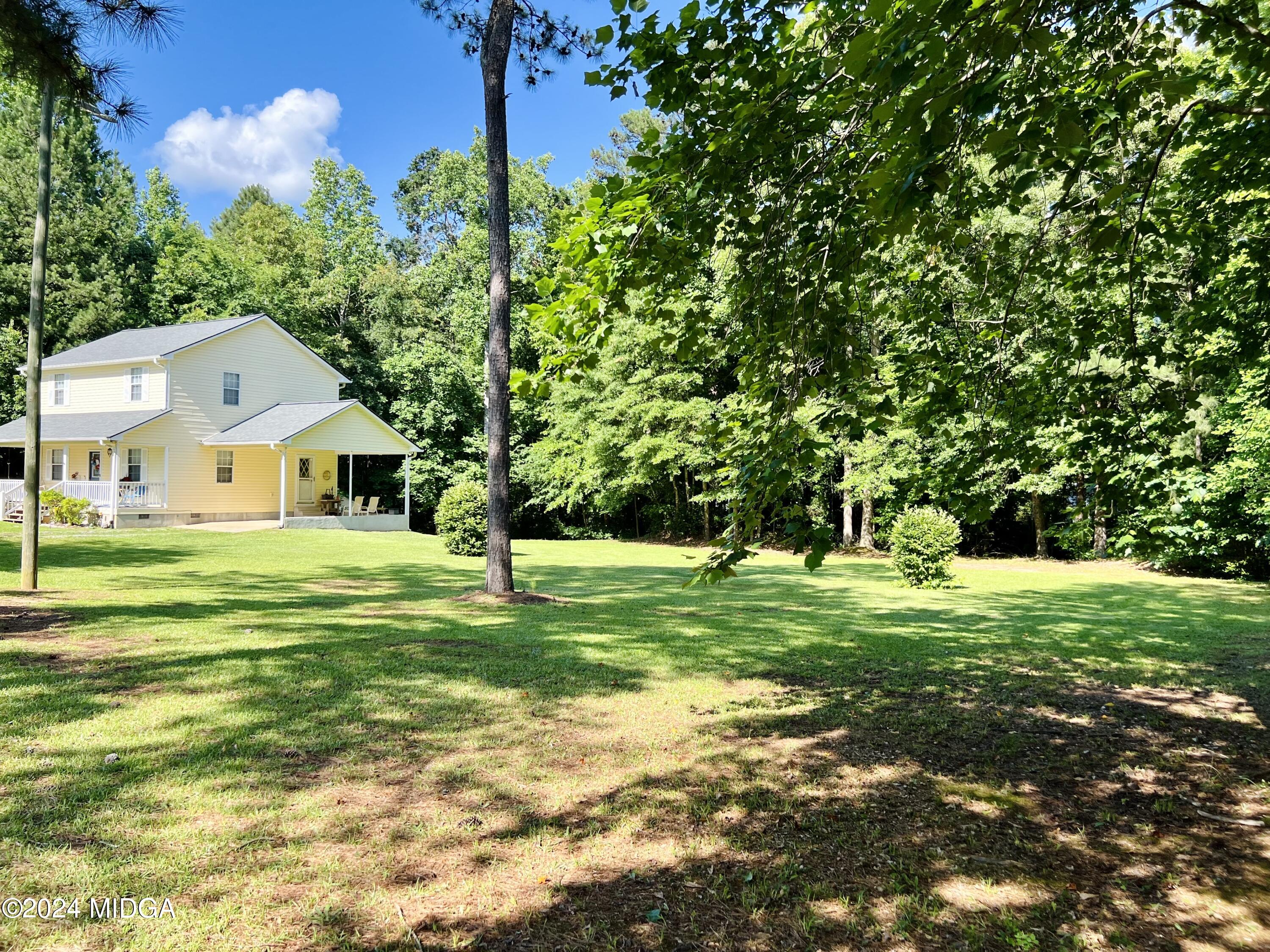 25 Ruby Road Jackson, GA 30233 - Photo 3 of 29 a front view of a house with a yard