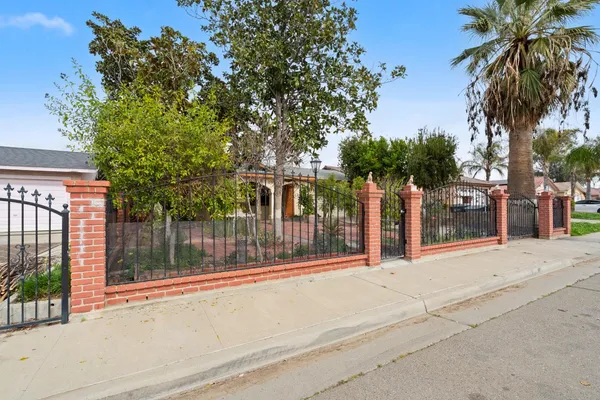 front view of a house with a garden
