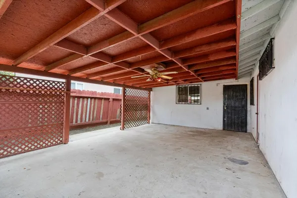 a view of porch with a garage