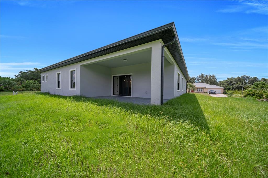 2328 Irondale Road North Port, FL 34287 - Photo 38 of 45 a view of a house with backyard