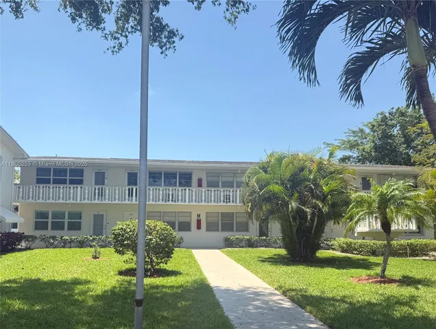 a room with furniture and wooden floor