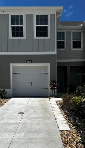 a house view with a outdoor space