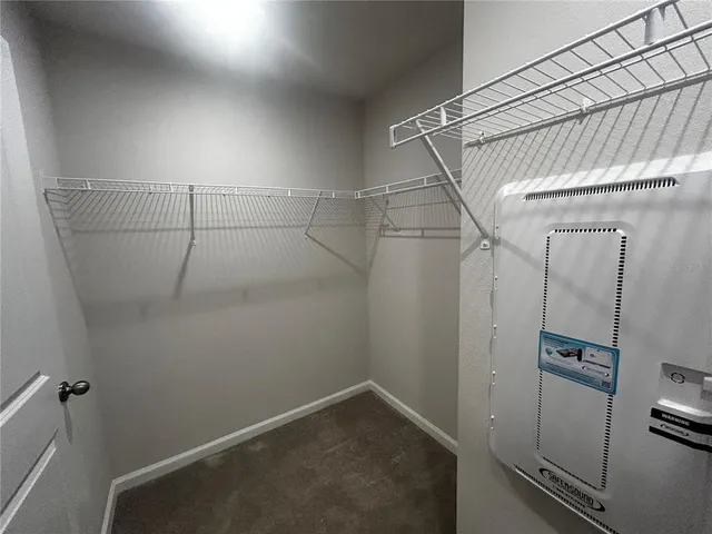 a view of a room with racks on the wall