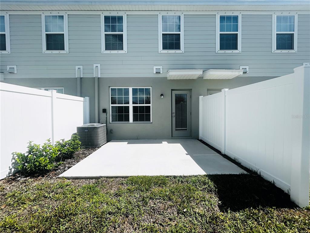 14124 Crimson Avenue Bradenton, FL 34211 - Photo 22 of 27 a view of a house with a backyard
