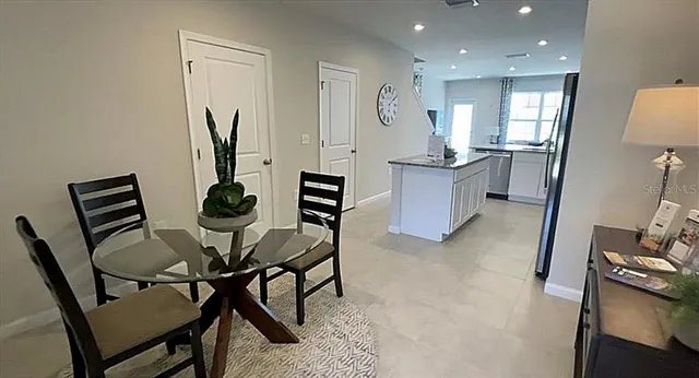 a kitchen with a sink stove and microwave