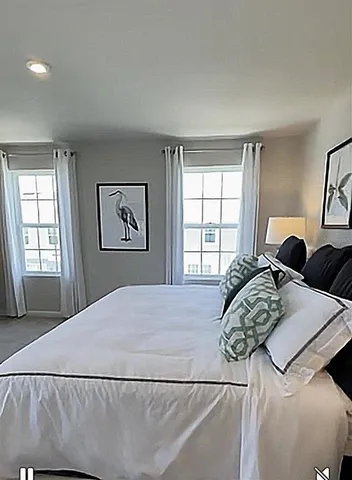 a bathroom with a double vanity sink mirror and toilet