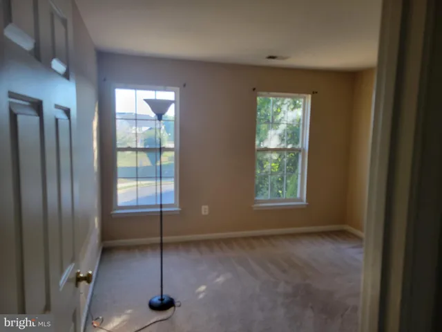 a view of an empty room with window