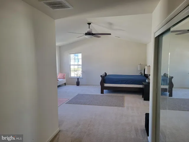 a view of livingroom with furniture and windows
