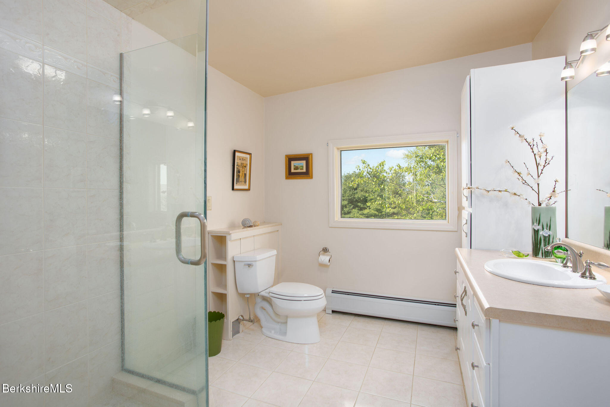 77 Hurlburt Road Great Barrington, MA 01230 - Photo 40 of 48 a bathroom with a toilet sink and mirror