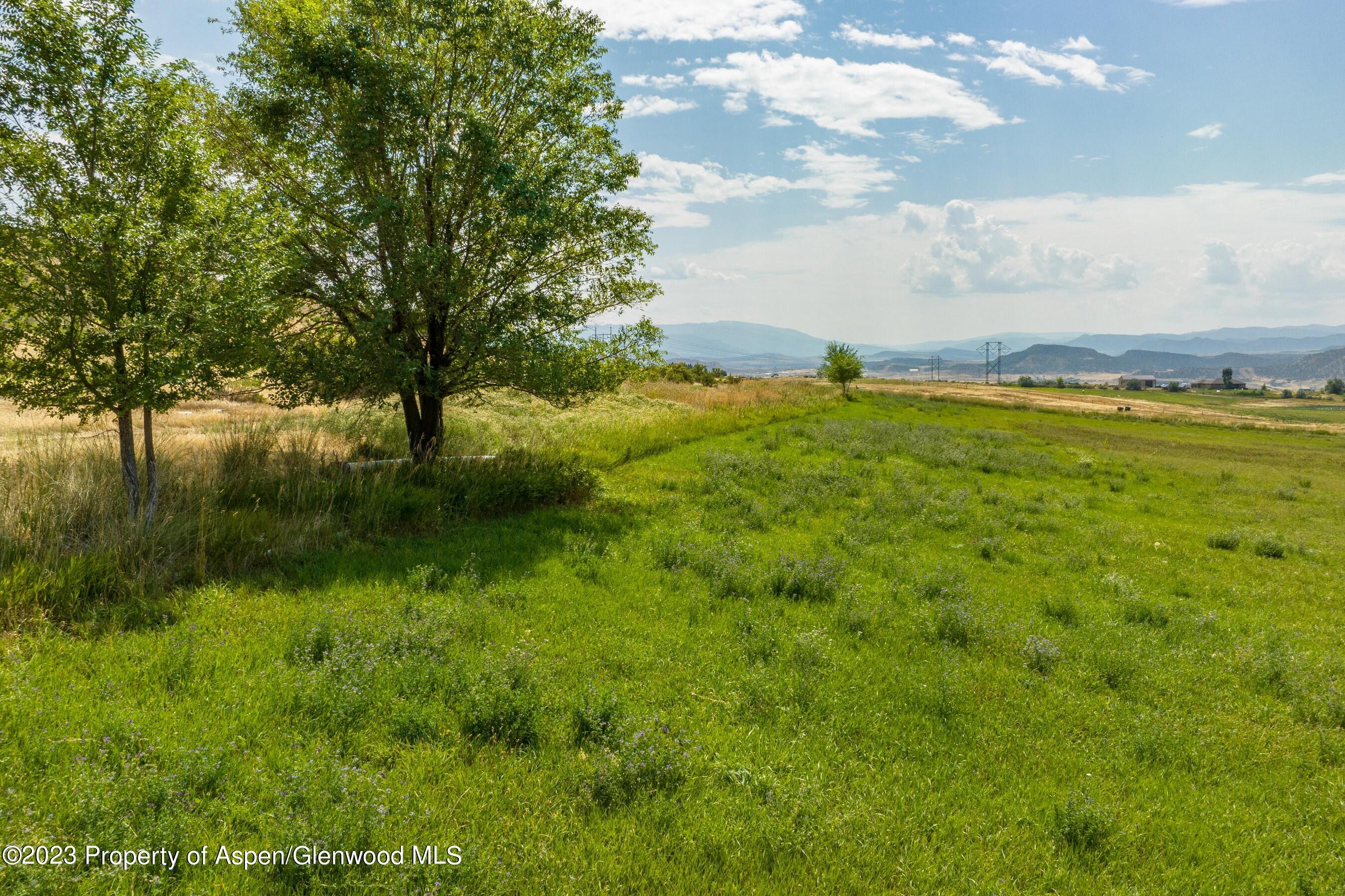Tbd Home Ranch Road Rifle, CO 81650 - Photo 6 of 9 a view of an ocean and a yard