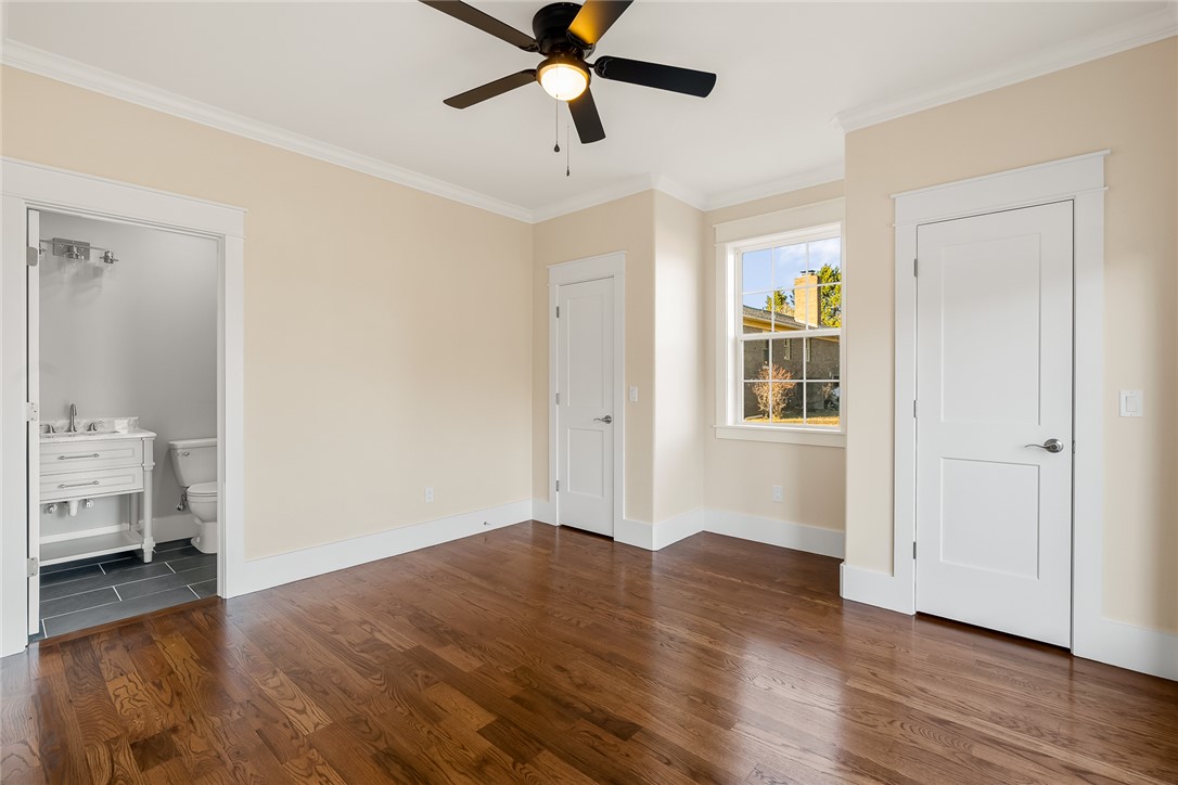303 Regency Circle Anderson, SC 29625 - Photo 27 of 50 This airy bedroom features gleaming hardwood floors and ample natural light, with a convenient adjoining bath.