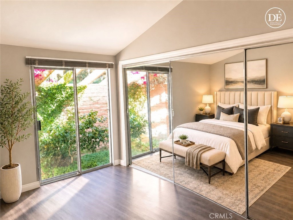 5945 Armaga Spring Road, Unit B Rancho Palos Verdes, CA 90275 - Photo 6 of 11 a bedroom with a bed and a large window