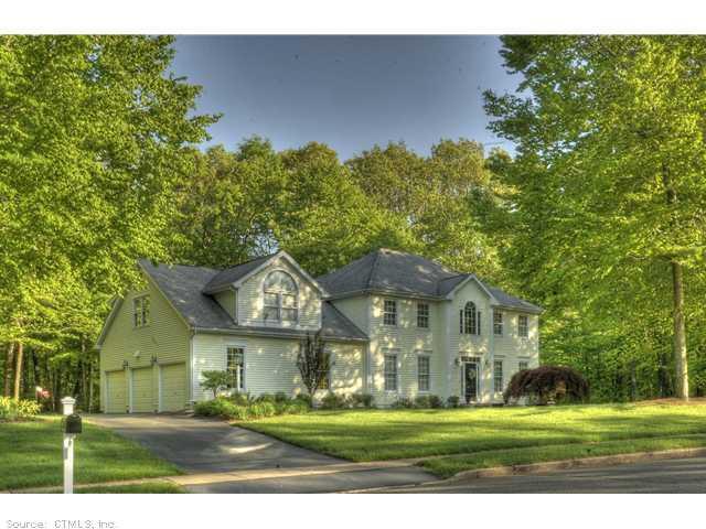 320 Oregon Road Cheshire, CT 06410 - Photo 1 of 1 a front view of a house with a yard