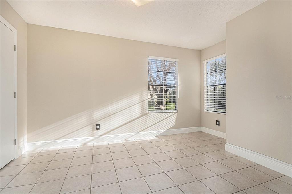 315 Lakepointe Drive, Unit 104 Altamonte Springs, FL 32701 - Photo 13 of 20 a view of an empty room with a window