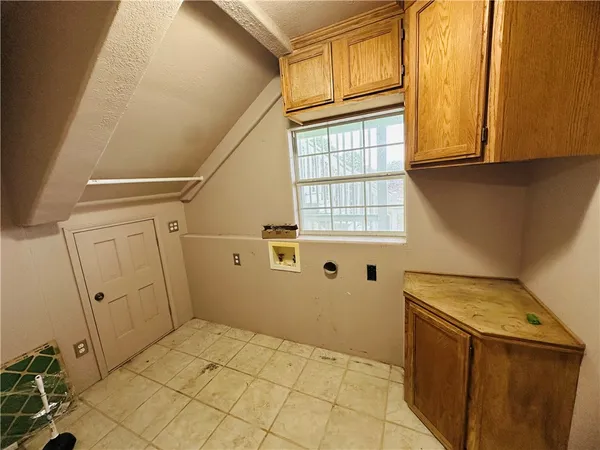 a view of a kitchen with a sink