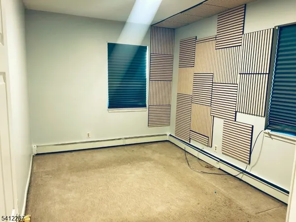 an empty room with windows