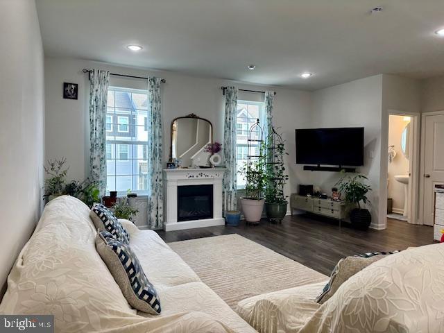 35 Stanton Road Mount Holly, NJ 08060 - Photo 13 of 49 a living room with furniture a fireplace and a flat screen tv