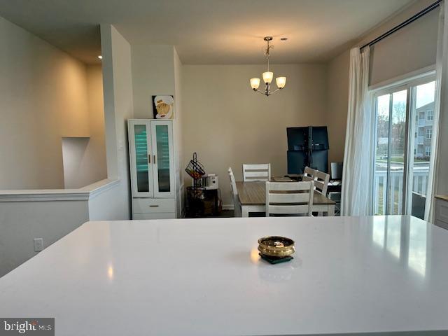 35 Stanton Road Mount Holly, NJ 08060 - Photo 18 of 49 a kitchen with a sink a chandelier and living room view