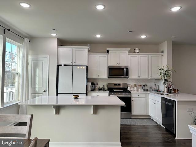 35 Stanton Road Mount Holly, NJ 08060 - Photo 19 of 49 a kitchen with stainless steel appliances granite countertop a sink refrigerator and cabinets