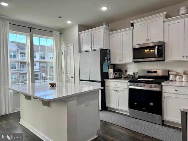 35 Stanton Road Mount Holly, NJ 08060 - Photo 22 of 49 a kitchen with stainless steel appliances granite countertop a stove a sink and a refrigerator