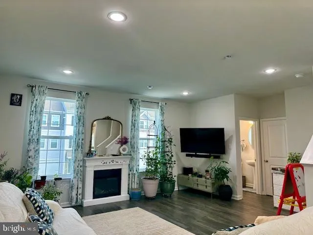 a view of a dining room with furniture and window