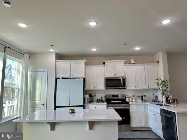 35 Stanton Road Mount Holly, NJ 08060 - Photo 27 of 49 a kitchen with stainless steel appliances granite countertop a refrigerator stove microwave and sink