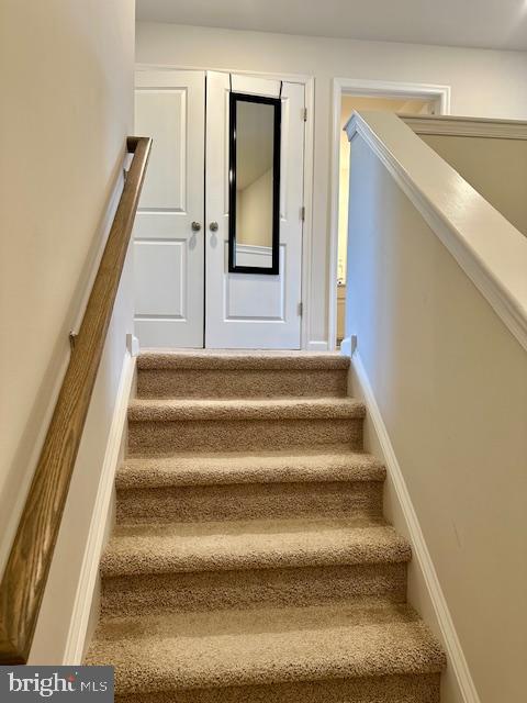 35 Stanton Road Mount Holly, NJ 08060 - Photo 30 of 49 a view of staircase with white walls and a window