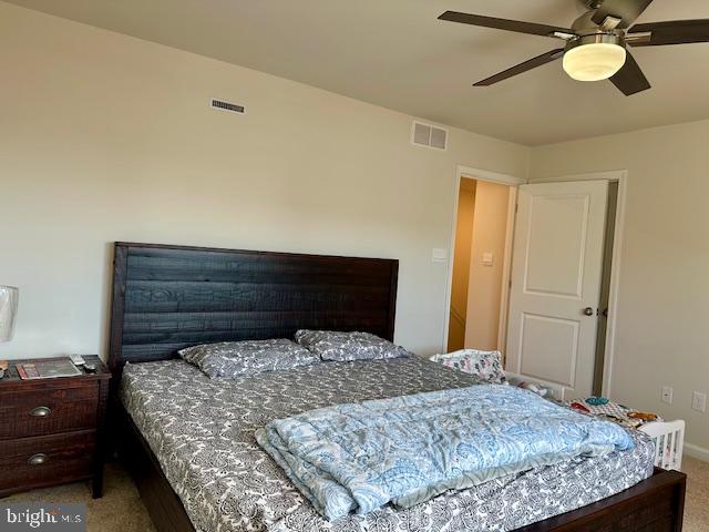 35 Stanton Road Mount Holly, NJ 08060 - Photo 32 of 49 a bedroom with a bed and a chandelier