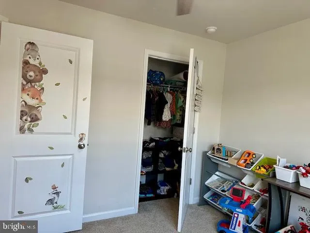a utility room with two washing machine and appliances