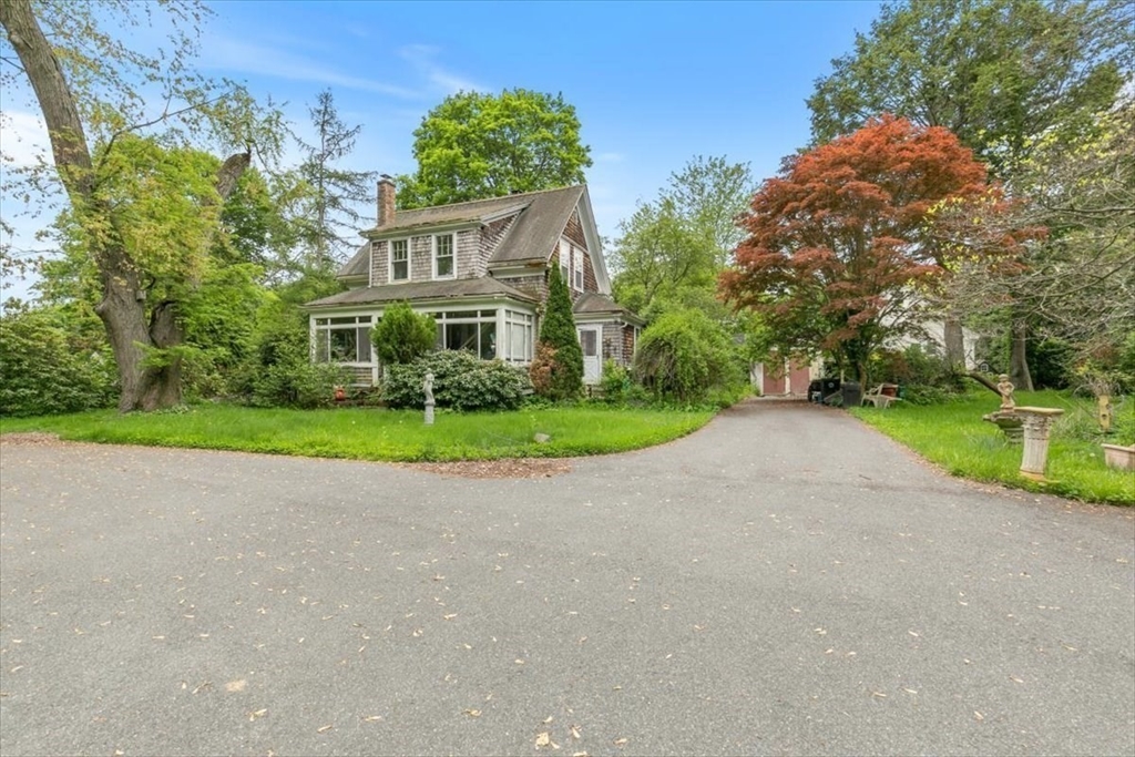 42 Maple Street Hamilton, MA 01982 - Photo 7 of 18 a view of house with yard and green space