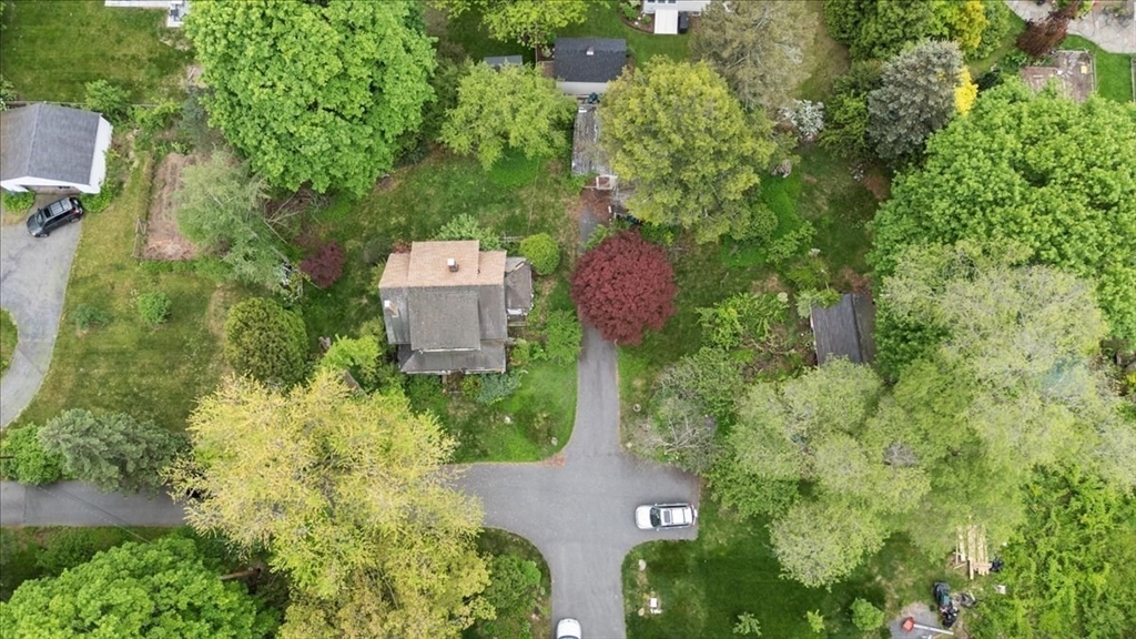 42 Maple Street Hamilton, MA 01982 - Photo 10 of 18 an aerial view of a house with a yard and large trees