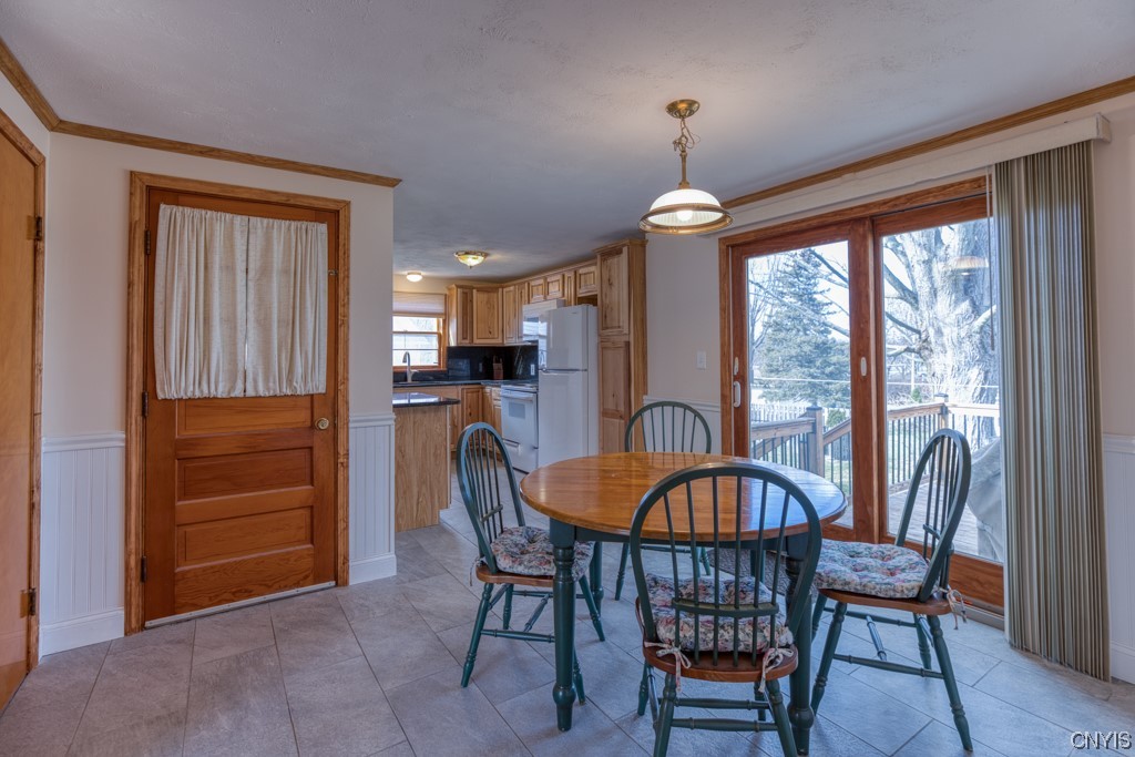 108 Blackmore Road Camillus, NY 13031 - Photo 18 of 39 Dining area walks out to rear deck.