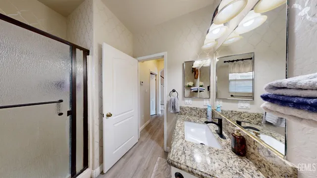 a kitchen with a stove a refrigerator and a stove