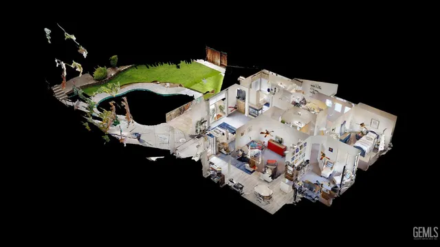 a bed sitting in a bedroom next to a lamp on a table