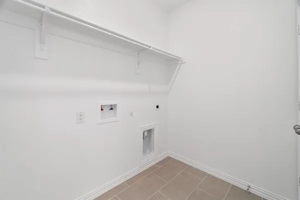 a bathroom with a double vanity sink mirror and bathtub