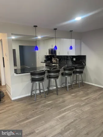 a kitchen with a cabinets and appliances