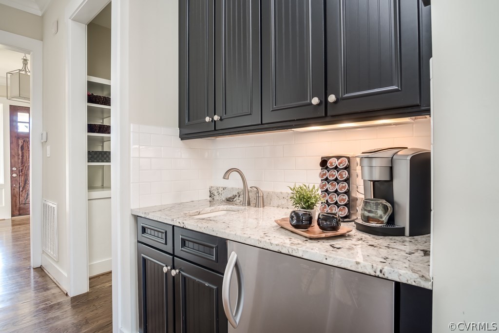 16006 Alsdell Road Midlothian, VA 23112 - Photo 17 of 46 a kitchen with a sink and cabinets