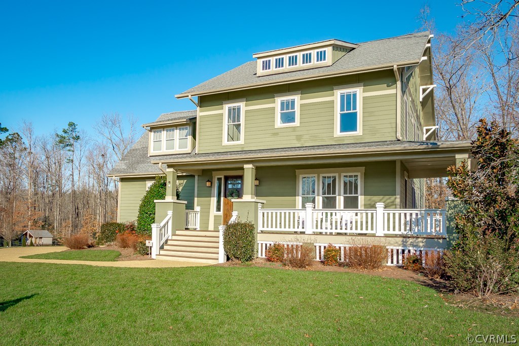 16006 Alsdell Road Midlothian, VA 23112 - Photo 2 of 46 a front view of a house with a garden and yard