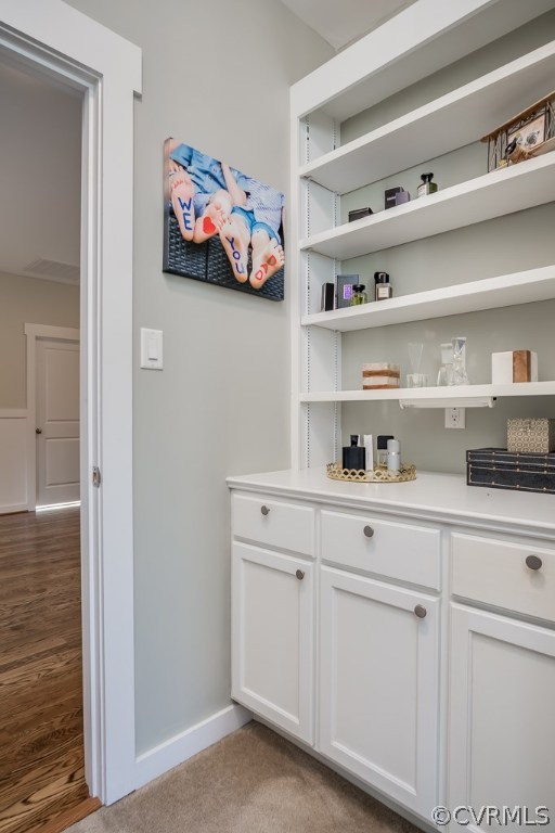 16006 Alsdell Road Midlothian, VA 23112 - Photo 28 of 46 a kitchen with white cabinets and white appliances