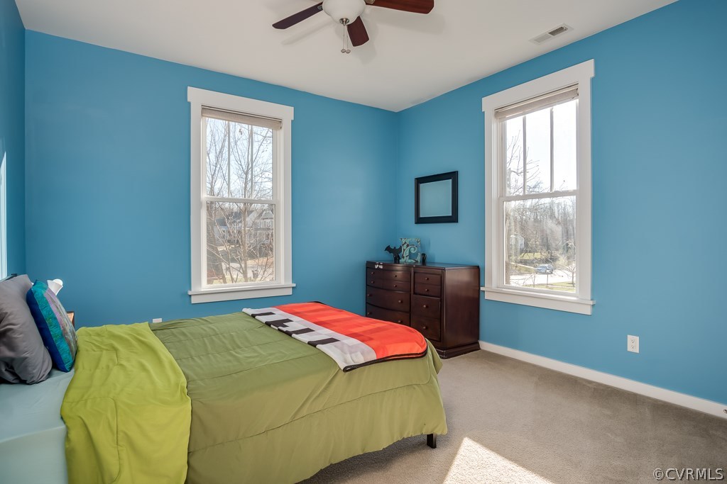 16006 Alsdell Road Midlothian, VA 23112 - Photo 31 of 46 a bedroom with a bed and a window