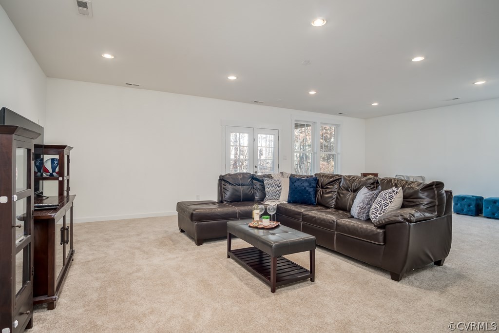 16006 Alsdell Road Midlothian, VA 23112 - Photo 35 of 46 a living room with furniture and a flat screen tv