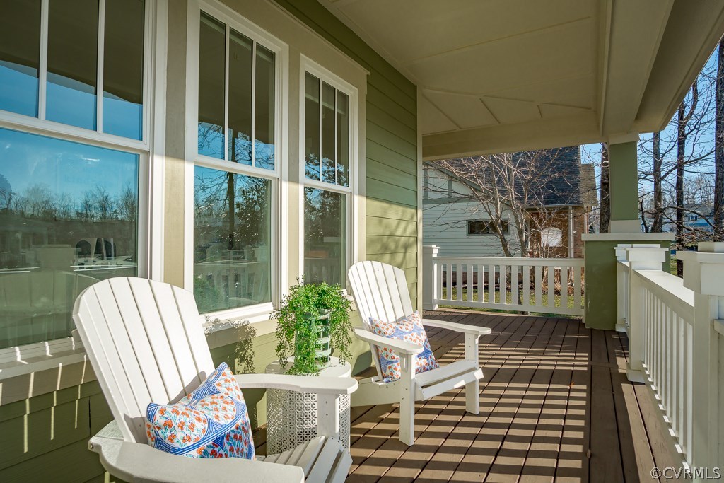 16006 Alsdell Road Midlothian, VA 23112 - Photo 5 of 46 a view of a chair and table in the balcony