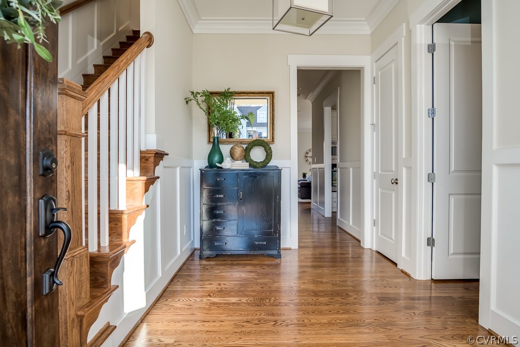 16006 Alsdell Road Midlothian, VA 23112 - Photo 7 of 46 a view of hallway with wooden floor and stairs