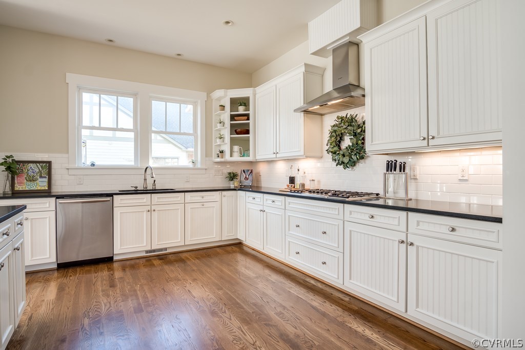 16006 Alsdell Road Midlothian, VA 23112 - Photo 8 of 46 a kitchen with granite countertop white cabinets and wooden floor