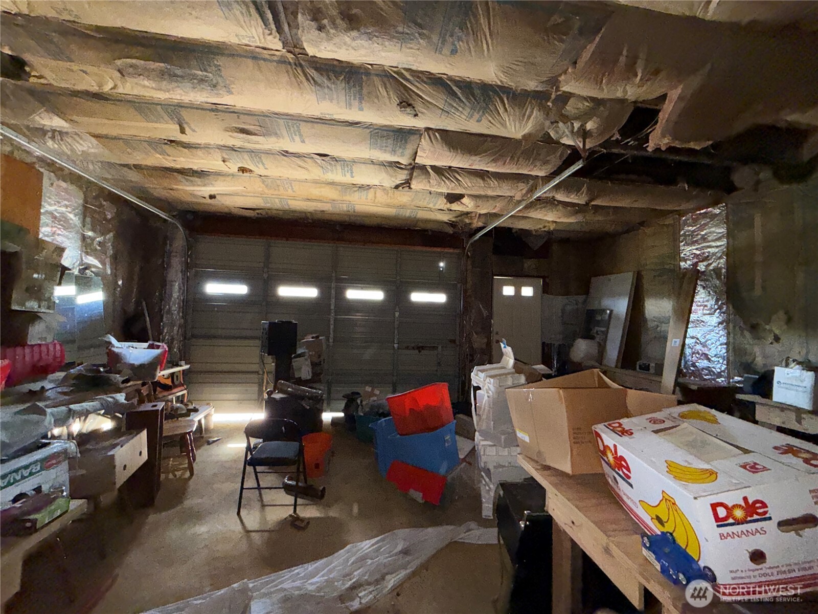 182 Kiwanis Road Republic, WA 99166 - Photo 9 of 13 a room with lots of furniture and clutter