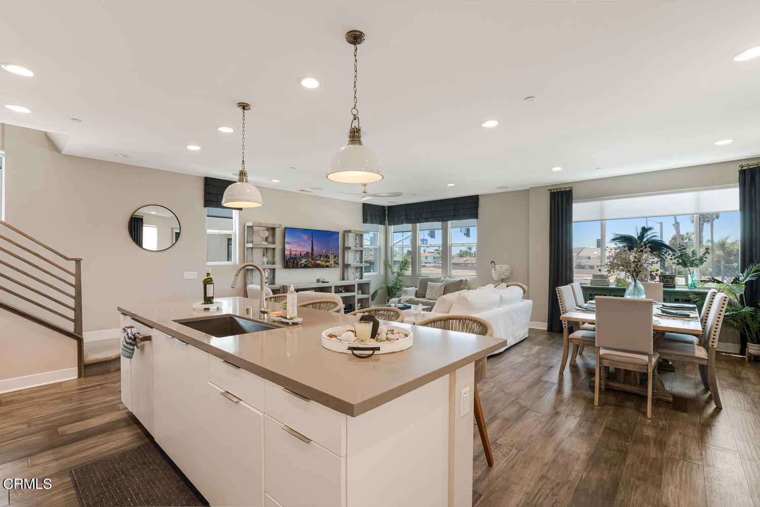 1028 Harbor Boulevard Oxnard, CA 93035 - Photo 17 of 48 a view of a dining room with furniture and wooden floor