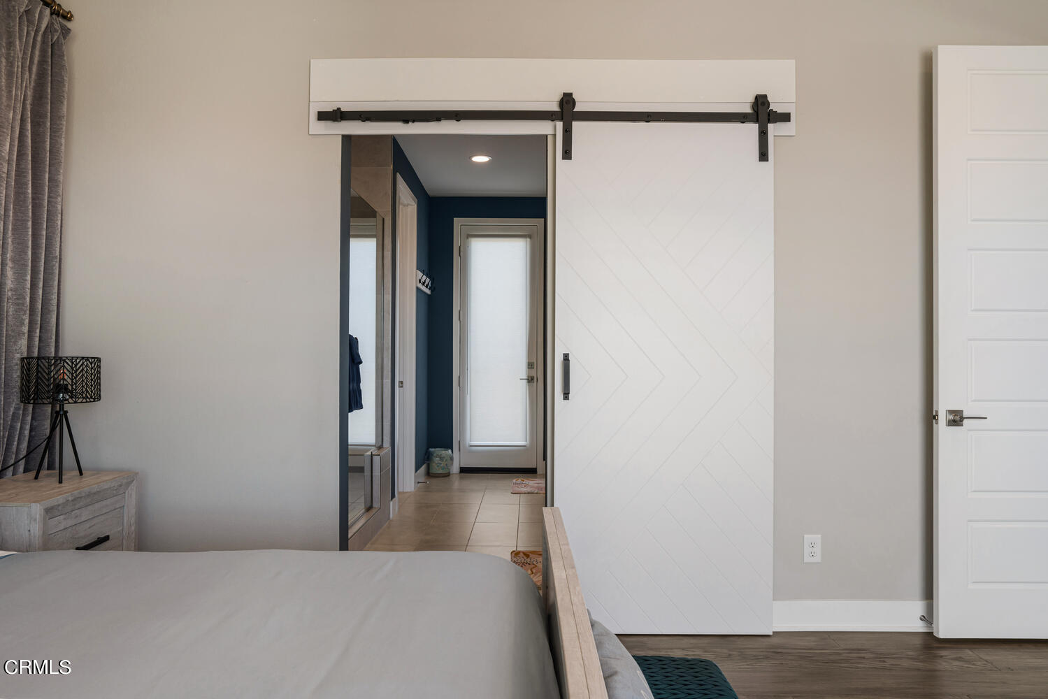 1028 Harbor Boulevard Oxnard, CA 93035 - Photo 24 of 48 a view of a bedroom from a hallway