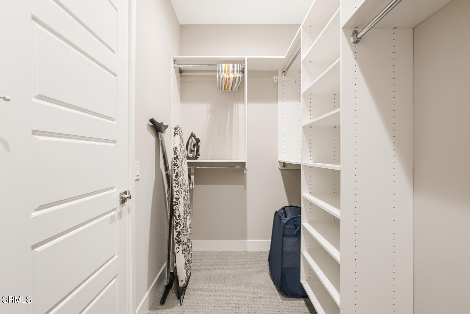 1028 Harbor Boulevard Oxnard, CA 93035 - Photo 27 of 48 a view of walk in closet with empty racks