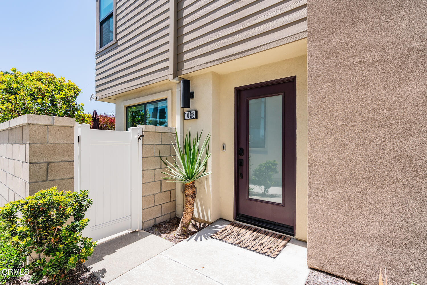 1028 Harbor Boulevard Oxnard, CA 93035 - Photo 6 of 48 a front view of a house with a yard